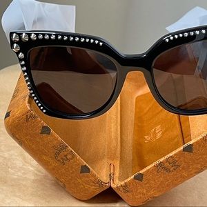 MCM cat eye shaped sunglasses. Black/ studs
